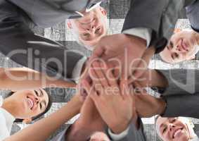 Business people with hands together