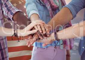 friends with hands together against american flag