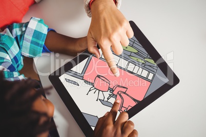 Two people looking at 3D drawings on a digital tablet