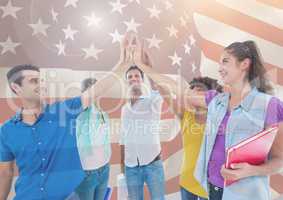 AFriends high fiving against american flag