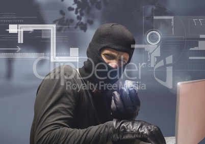 Hacker taking a picture with a smartphone and using a laptop in front of digital background