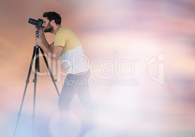 Photographer in front of lights in fog