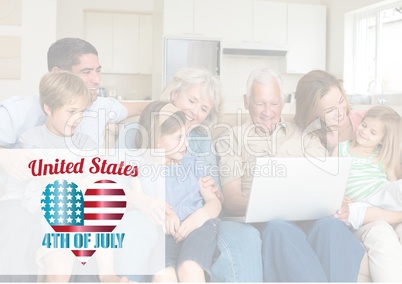 Happy family loong at the laptop for the 4th of July