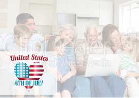 Happy family loong at the laptop for the 4th of July