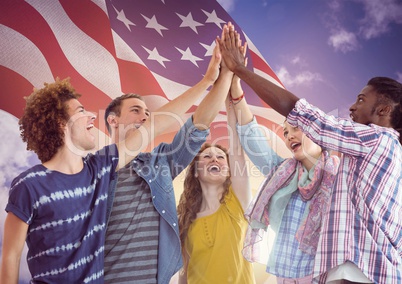American Flag with young people high five hands together