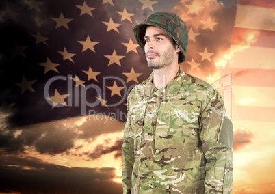 Happy soldier standing on american flag background