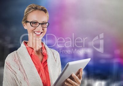 Woman with tablet against blurry purple wall with city doodle