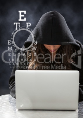 3d Woman hacker using a laptop in front of dark background