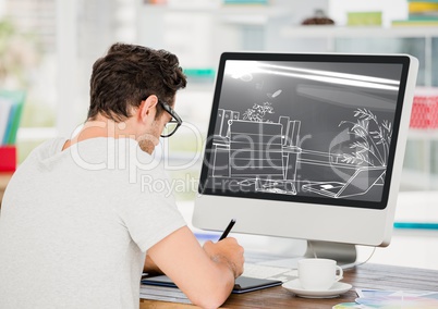 young man working in on the computer on the design of the new office (two-tone> grey and white)