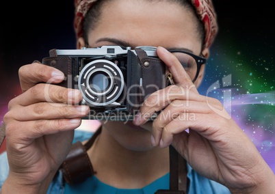 Photographer taking picture against galaxy background