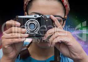 Photographer taking picture against galaxy background