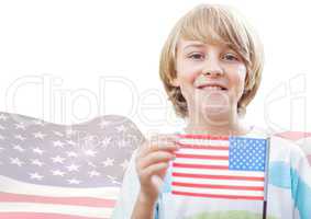 Smiling boy holding an american flag against fluttering american flag