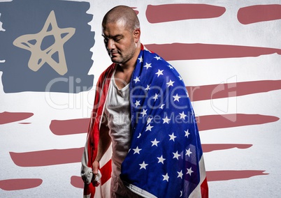 Man wrapped in american flag against hand drawn american flag and white wall
