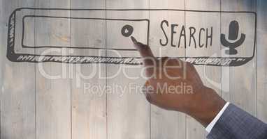 Hand pointing at search bar against grey wood panel