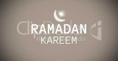 White Ramadan graphic with flare against brown background