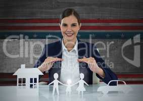 Business woman with house, family and car on paper