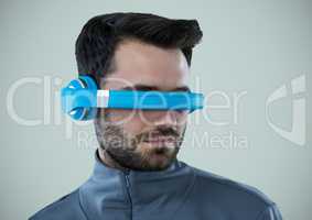 Man in virtual reality headset against light grey background