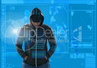 hacker with arms in pocket in front of blue digital background