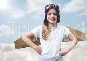 Girl in pilot costume against sky with flare