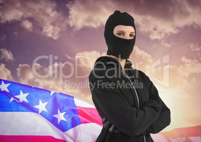 Masked women standing on american flag