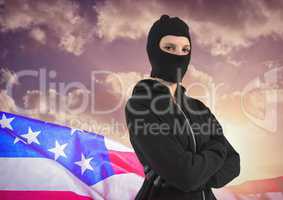 Masked women standing on american flag