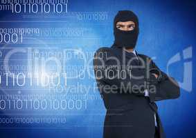 Hacker with hood and arms crossed standing on in front of blue background
