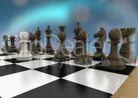 3d Chess pieces against blue bokeh