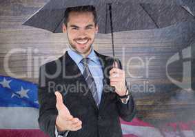 3d Businessman offering his hand holding an umbrella against american flag background