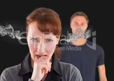anger  woman with hand on mouth and  steam on ears., with blurred man behind.