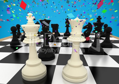 3d Chess pieces against blue background with confetti