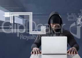 Hacker using a laptop in a 3D dark room