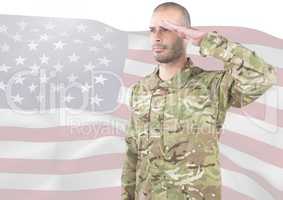 Soldier with hand on head in front of american flag