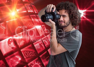 Photographer taking a picture in front of a photo montage frame