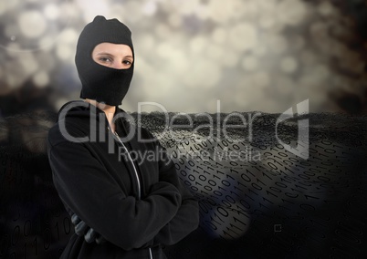 Woman hacker with hood and arms crossed standing on in front of digital background