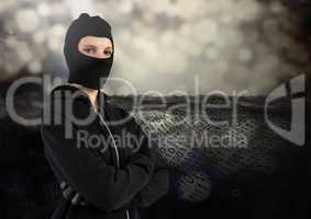 Woman hacker with hood and arms crossed standing on in front of digital background