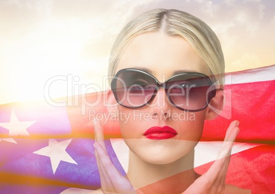 Blond woman wearing sunglasses against american flag in the background