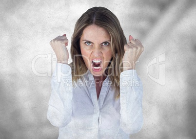 Angry business woman against blurry grey stairs with grunge overlay