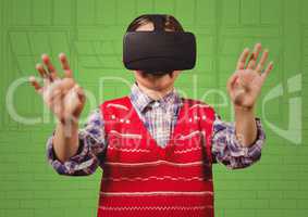 Boy in 3d virtual reality headset against green hand drawn windows