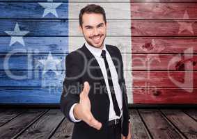 Business man shaking his hand against american flag