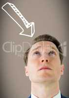 Man looking up at 3D white downward arrow against brown background