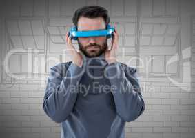 Man in blue virtual reality headset against 3d grey hand drawn windows