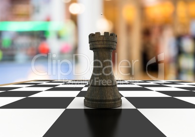 3D Chess piece against blurry background