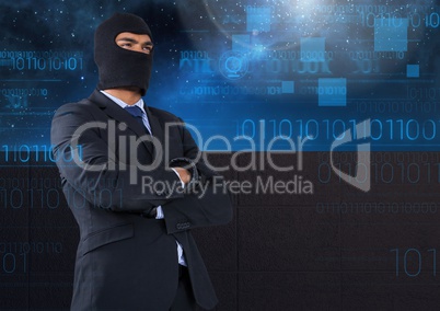 Business hacker with arms crossed in front of blue night sky