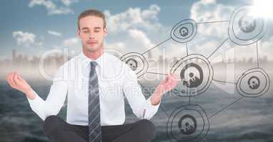 Business man meditating against blurry skyline and water with 3D network doodle