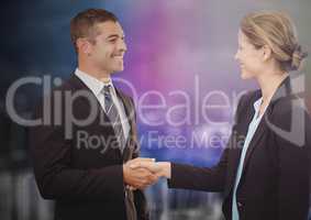 Business people shaking hands against blurry purple wall with city doodle