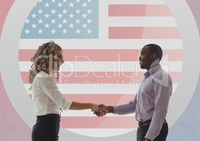 Business people shanking teheir hands against american flag