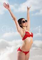 Woman in red bikini against sunny sky