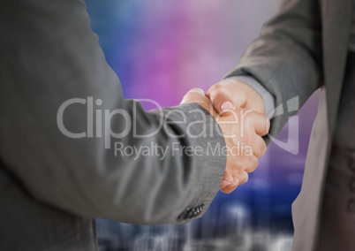 Business handshake against blurry purple wall with city doodle