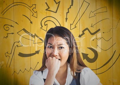 Frustrated business woman against 3D yellow wood panel and arrow graphics