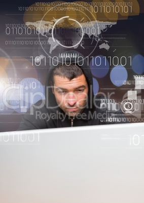 Close up of hacker using a laptop behind a 3D digital screen